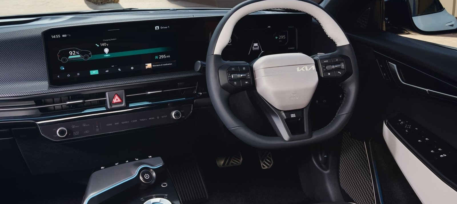 Kia EV6 interior with dual 12.3-inch curved screens and flat floor