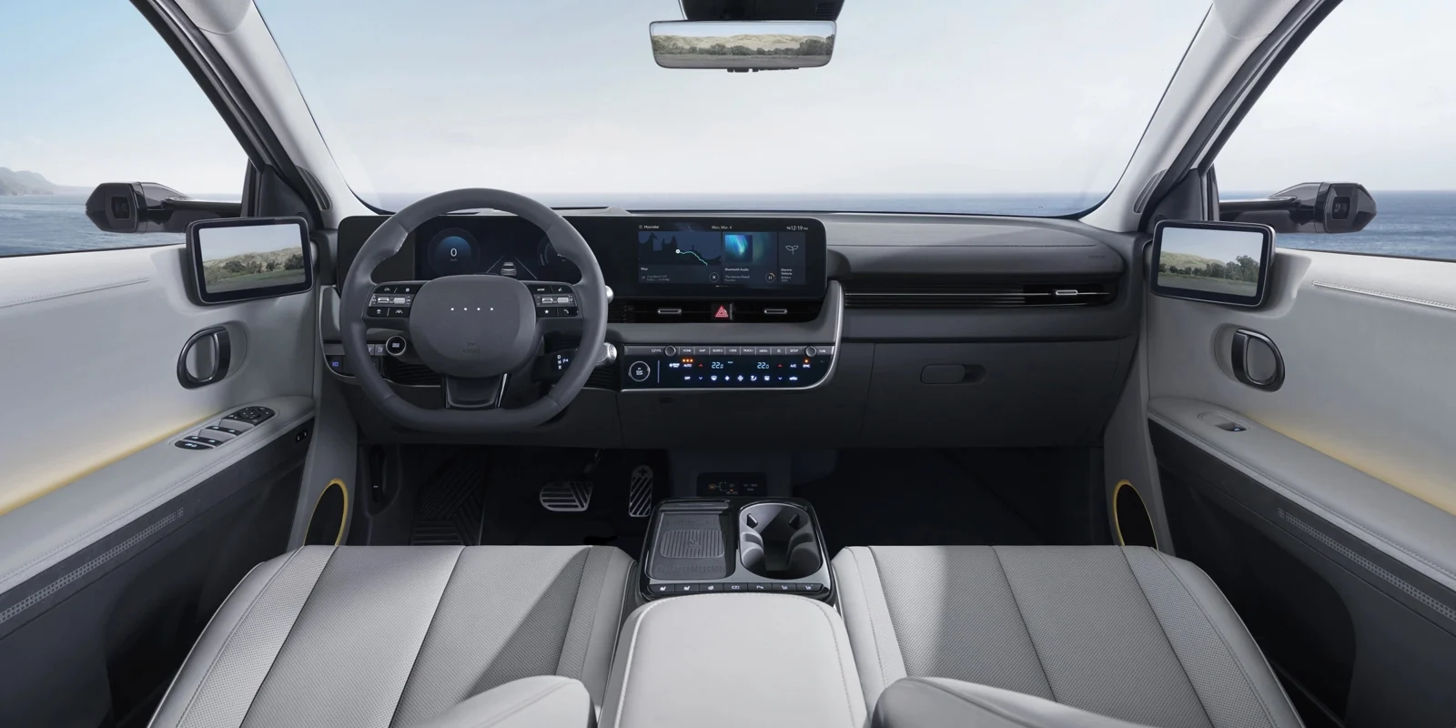 Hyundai IONIQ 5 dashboard, twin screens and front seats