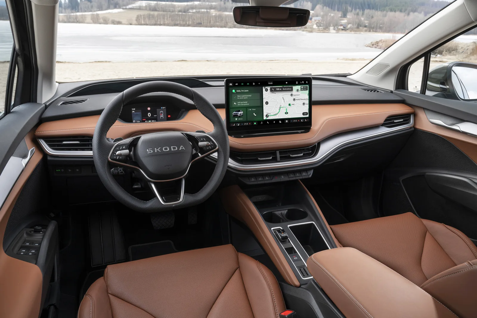 Skoda Enyaq dashboard, central touchscreen and front seats